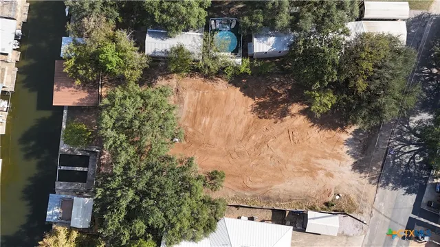 an aerial view of residential house with outdoor space