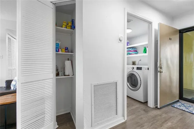 a utility room with dryer and washer