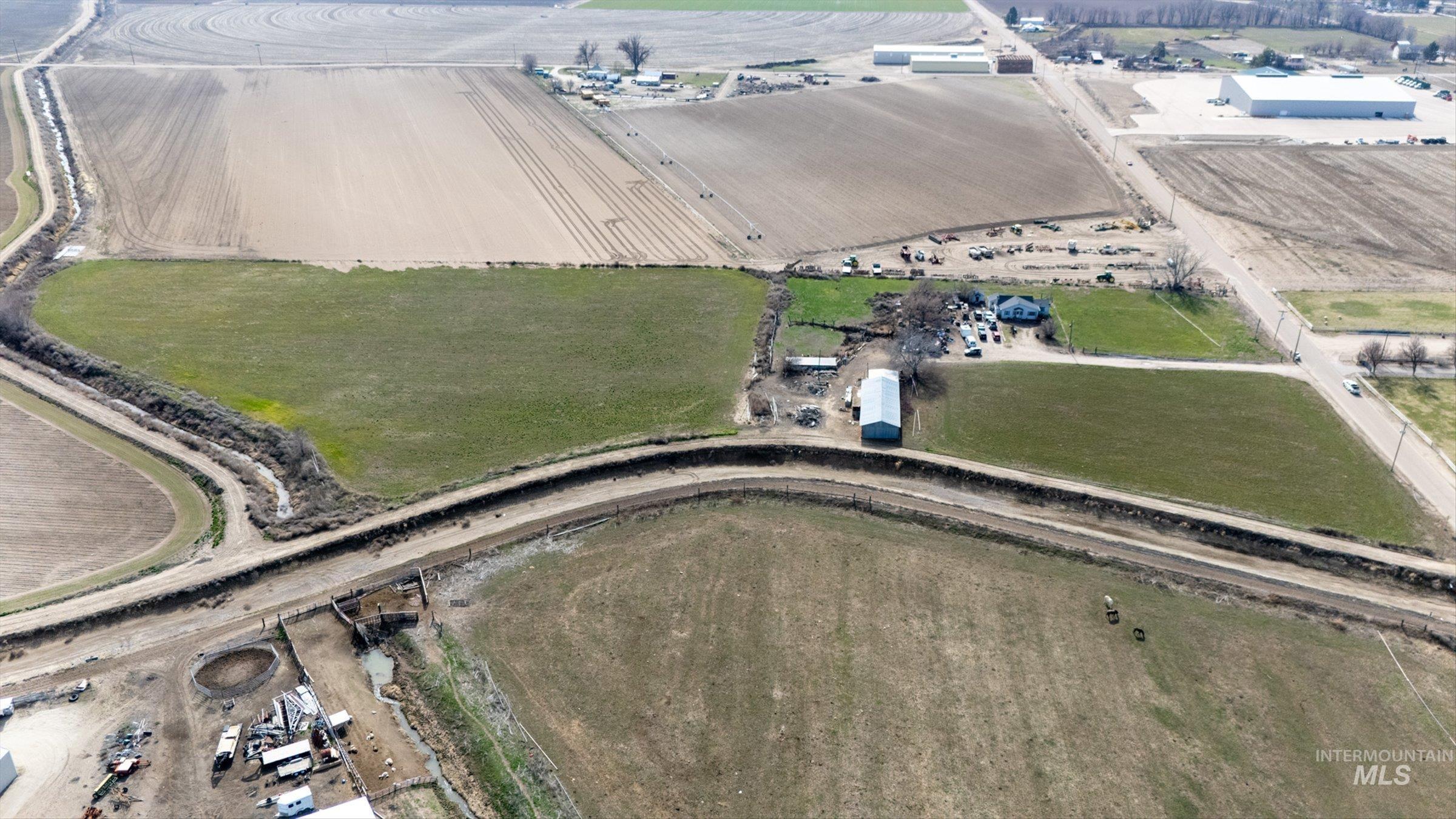 20286 Travis Road Wilder, ID 83676 - Photo 12 of 27 Aerial overview of property's location featuring rural landscape and extensive farmland
