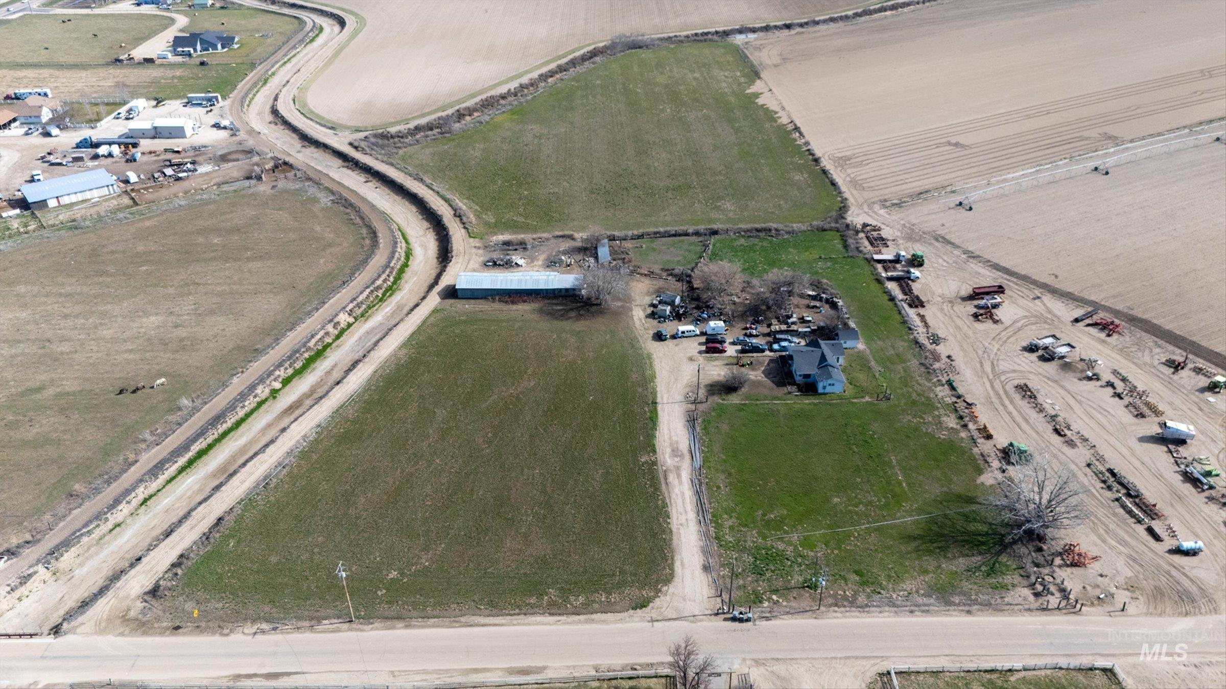 20286 Travis Road Wilder, ID 83676 - Photo 15 of 27 Aerial view of property's location with rural landscape and farmland