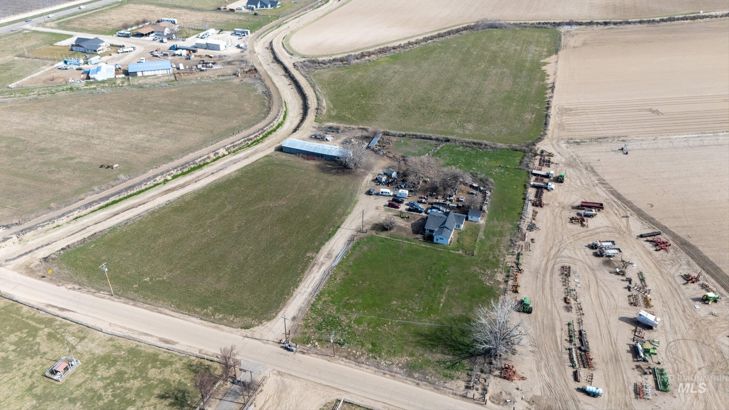 20286 Travis Road Wilder, ID 83676 - Photo 16 of 27 Aerial view of property's location with rural landscape and extensive farmland