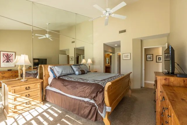 a bathroom with a shower and a sink