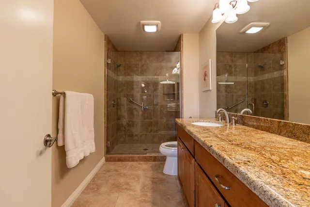 a view of a table and chairs in the patio