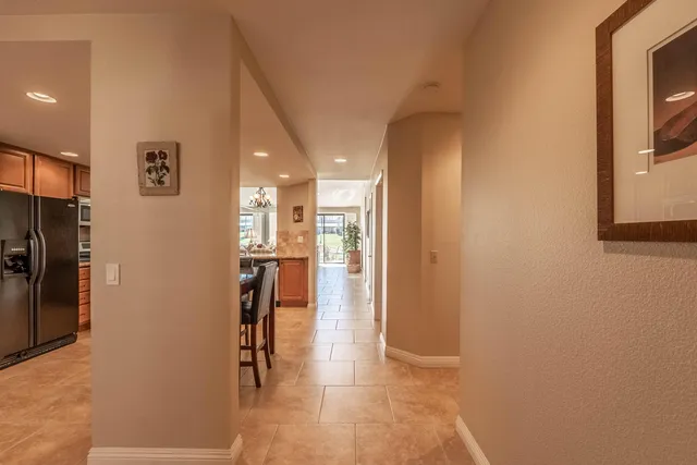 a kitchen with stainless steel appliances a refrigerator stove microwave and cabinets