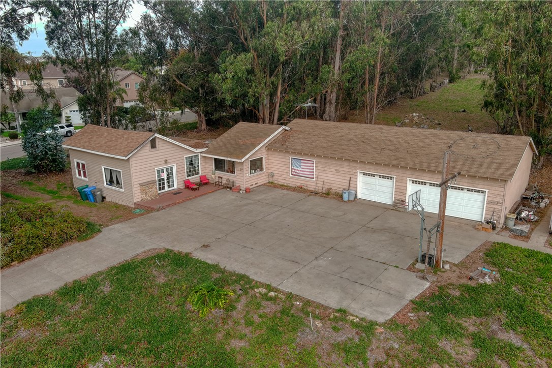 2845 Cienaga Street Oceano, CA 93445 - Photo 2 of 20 an aerial view of residential houses with yard and trees