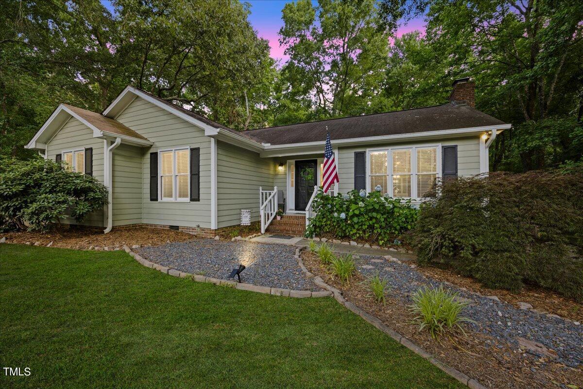 1408 Roy Averette Drive Raleigh, NC 27603 - Photo 2 of 31 a front view of house with yard and green space