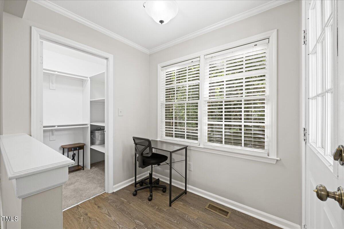 1408 Roy Averette Drive Raleigh, NC 27603 - Photo 10 of 31 a workspace with furniture and a window