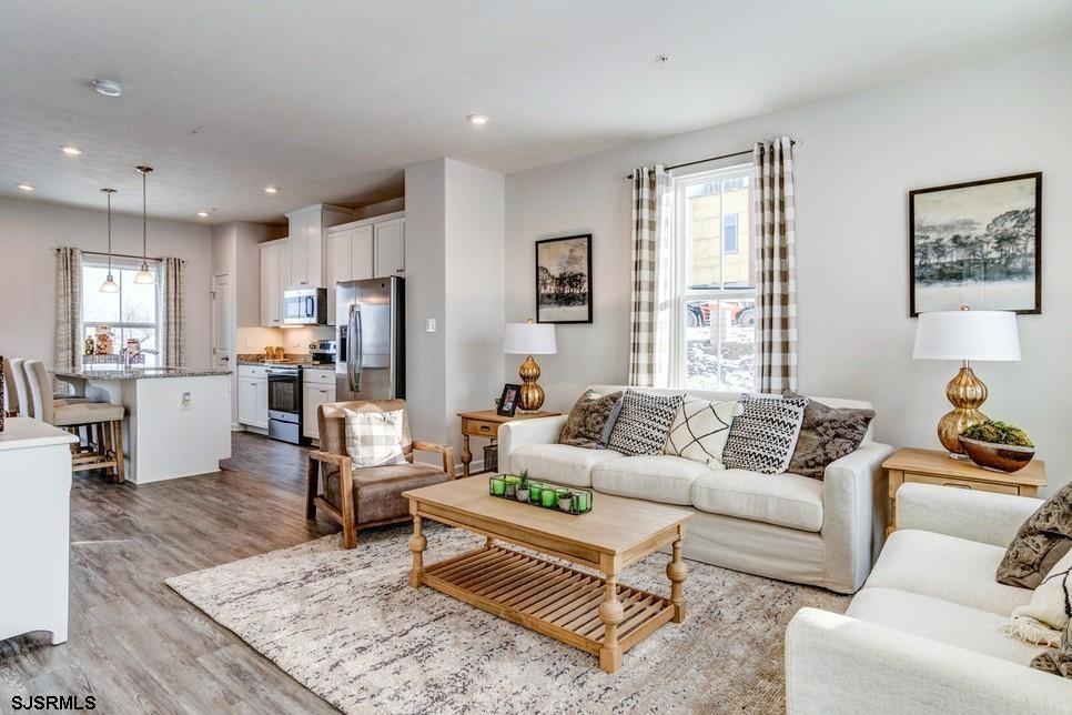 2102 East Oak Road, Unit N6 Vineland, NJ 08361 - Photo 2 of 4 a living room with furniture and a large window