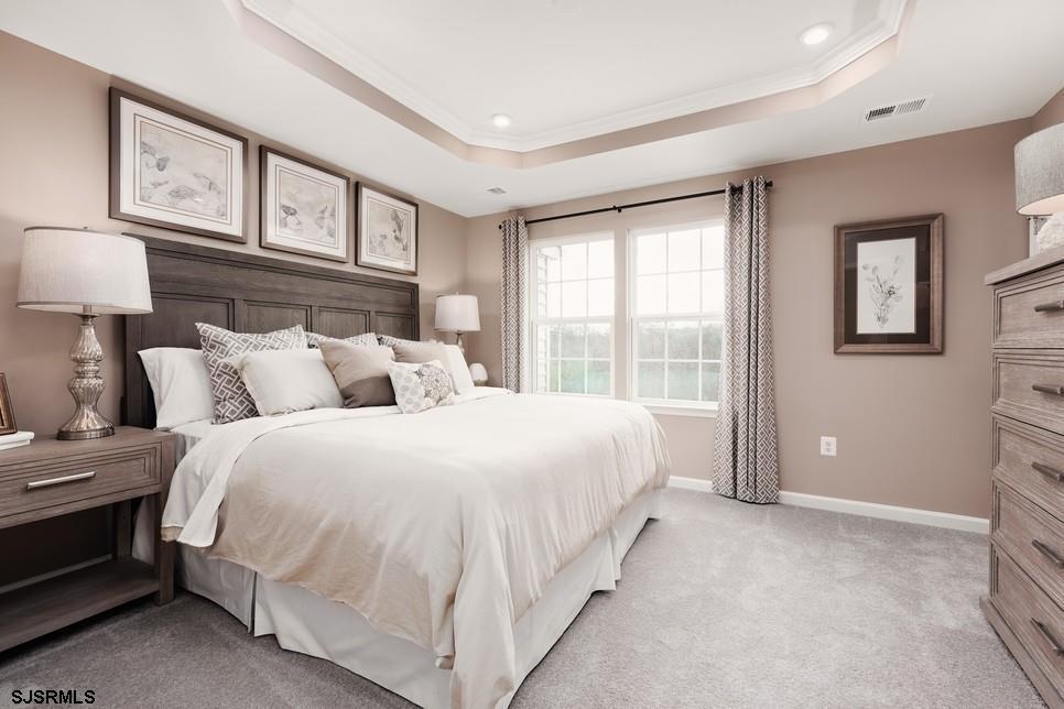 2102 East Oak Road, Unit N6 Vineland, NJ 08361 - Photo 3 of 4 a spacious bedroom with two beds and painting on the wall