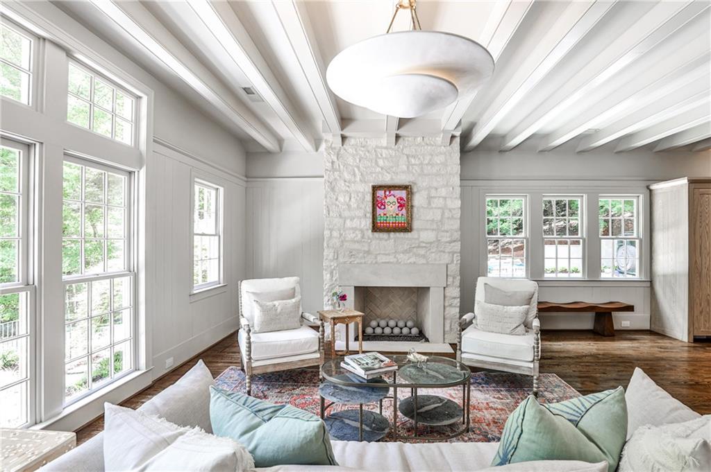 3990 Paces Ferry Road Northwest Atlanta, GA 30327 - Photo 13 of 67 a living room with furniture fireplace and a large window