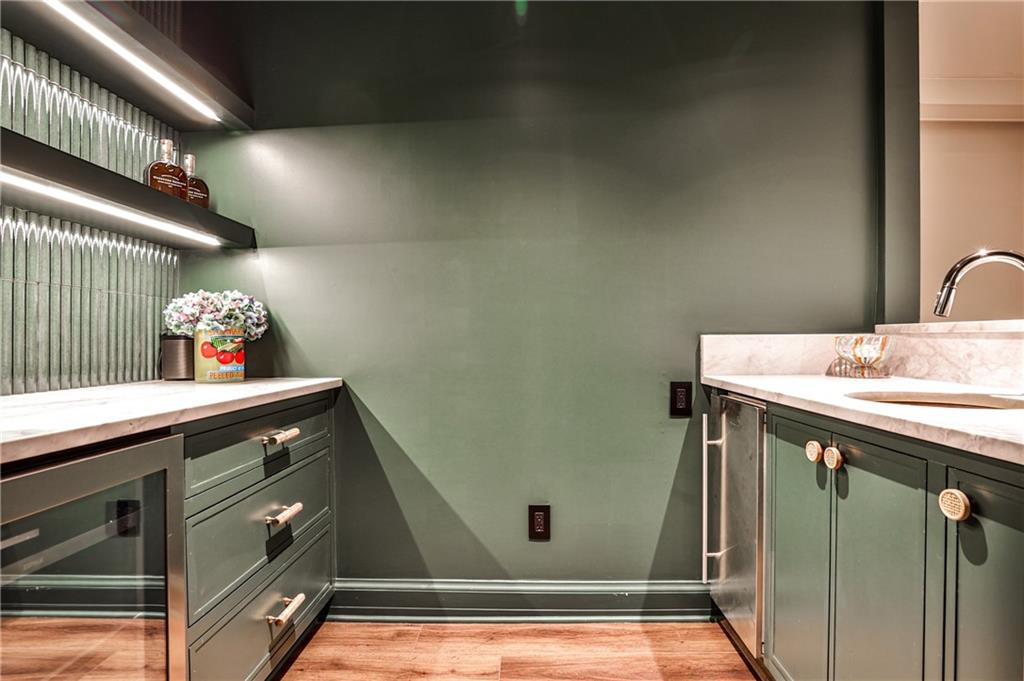 3990 Paces Ferry Road Northwest Atlanta, GA 30327 - Photo 37 of 67 a bathroom with a sink and a mirror