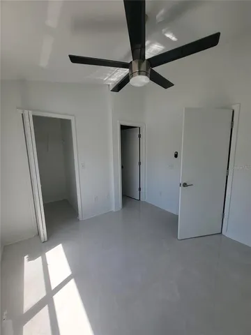 a view of a room with racks on the wall