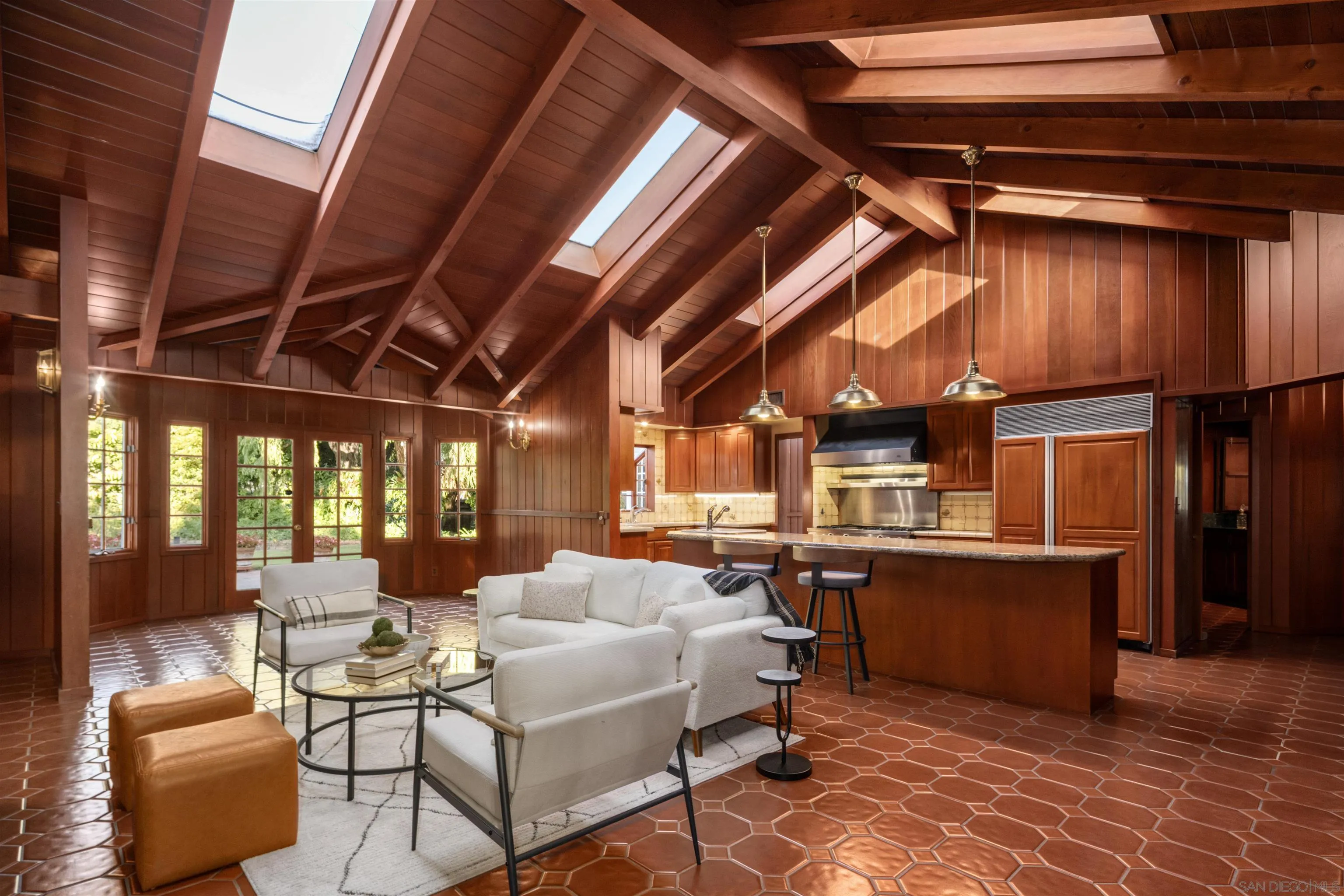 1654 La Jolla Rancho Road La Jolla, CA 92037 - Photo 12 of 31 a living room with lots of furniture and appliances