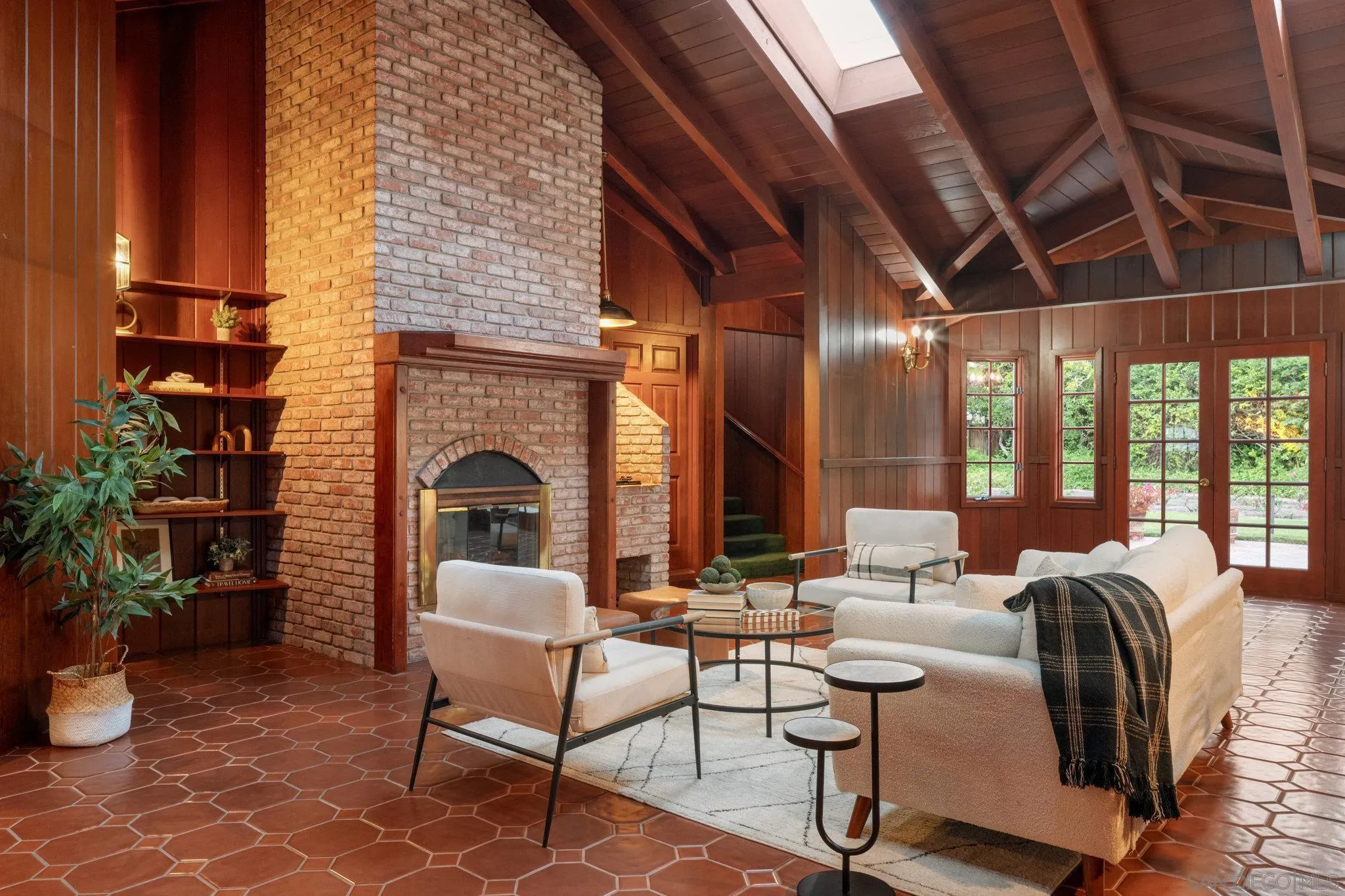 1654 La Jolla Rancho Road La Jolla, CA 92037 - Photo 14 of 31 a living room with furniture fireplace and potted plants