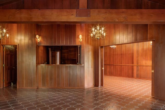 a view of hallway with windows