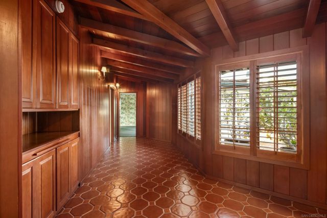 a living room with furniture a window and a fireplace