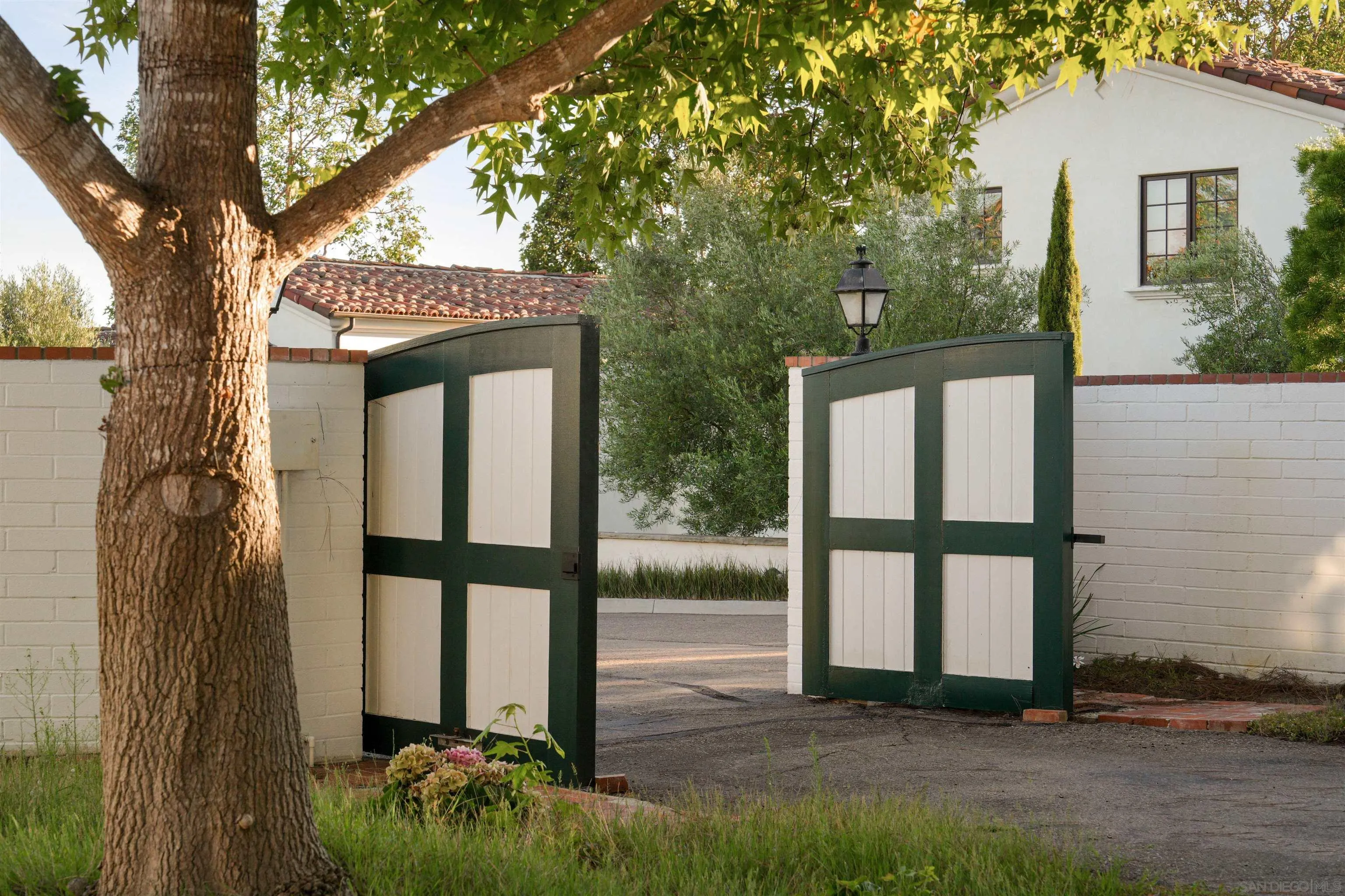 1654 La Jolla Rancho Road La Jolla, CA 92037 - Photo 23 of 31 a house view with a garden