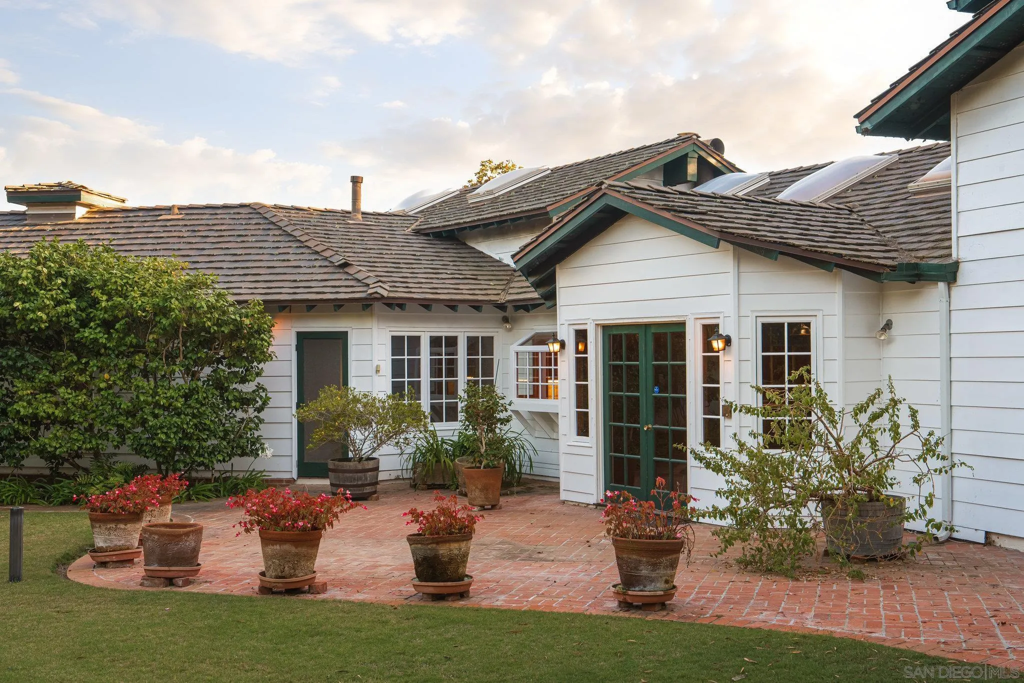 1654 La Jolla Rancho Road La Jolla, CA 92037 - Photo 29 of 31 a front view of a house with garden