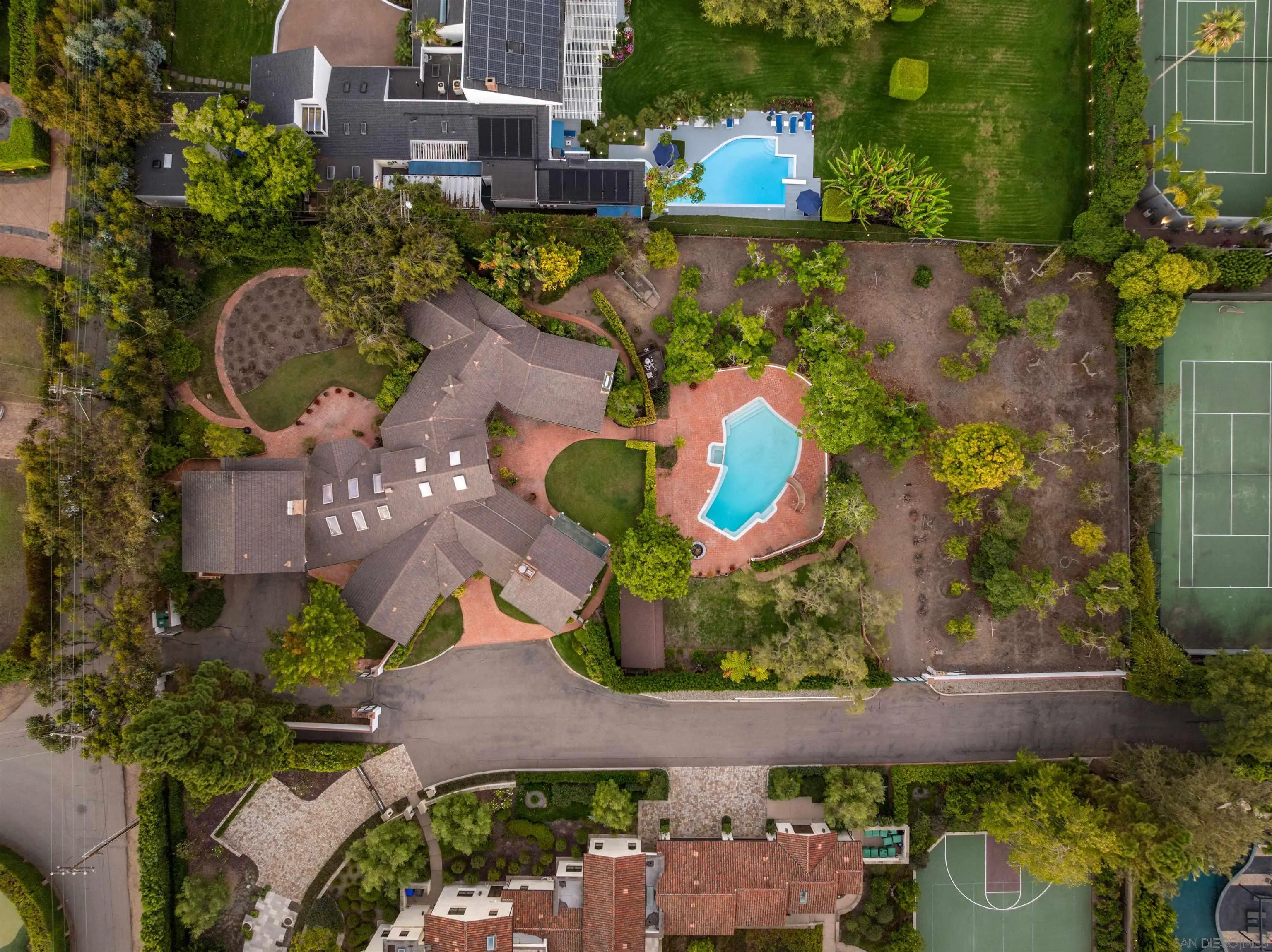 1654 La Jolla Rancho Road La Jolla, CA 92037 - Photo 30 of 31 an aerial view of a house with a yard and a fountain