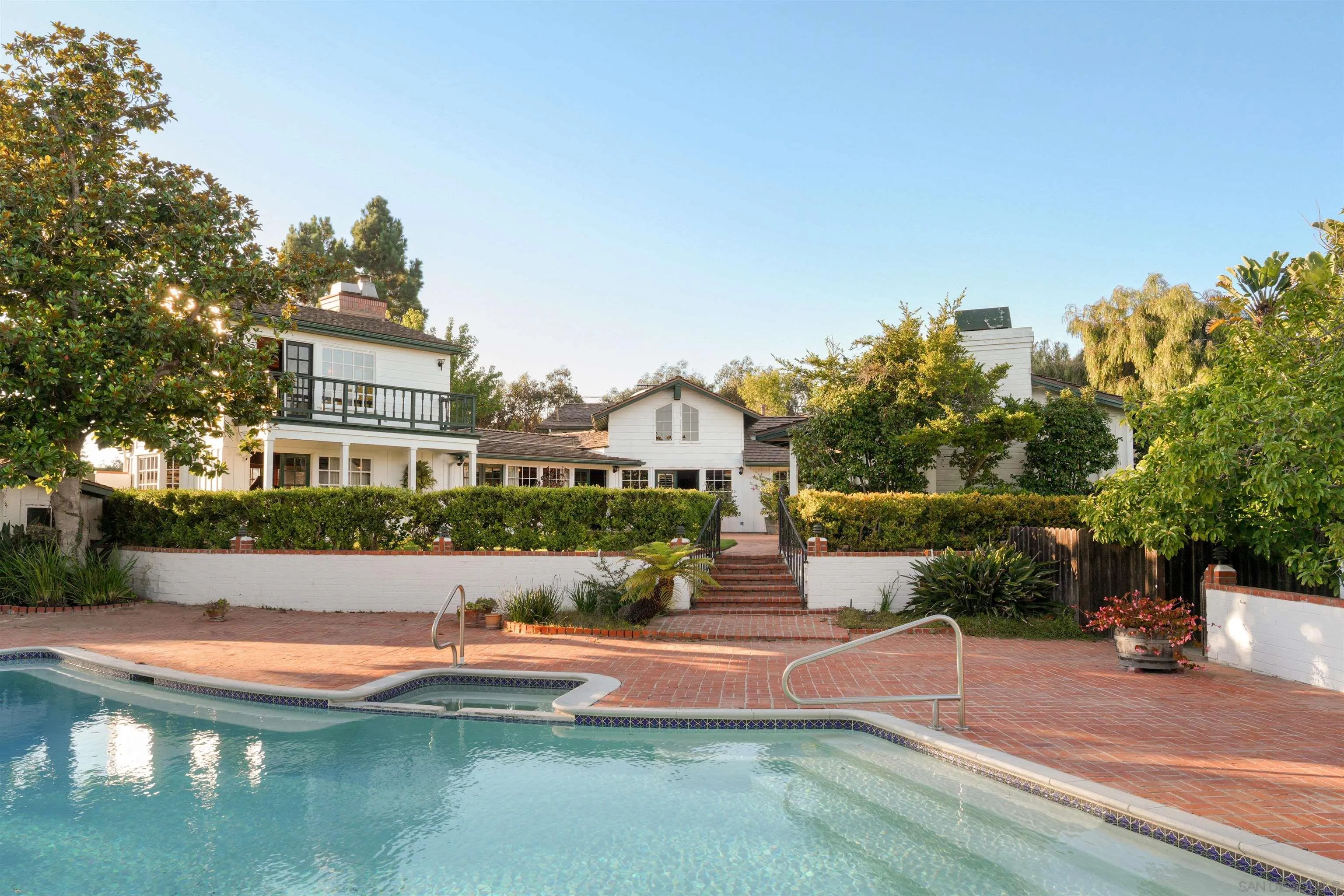 1654 La Jolla Rancho Road La Jolla, CA 92037 - Photo 10 of 31 a front view of a house with a yard