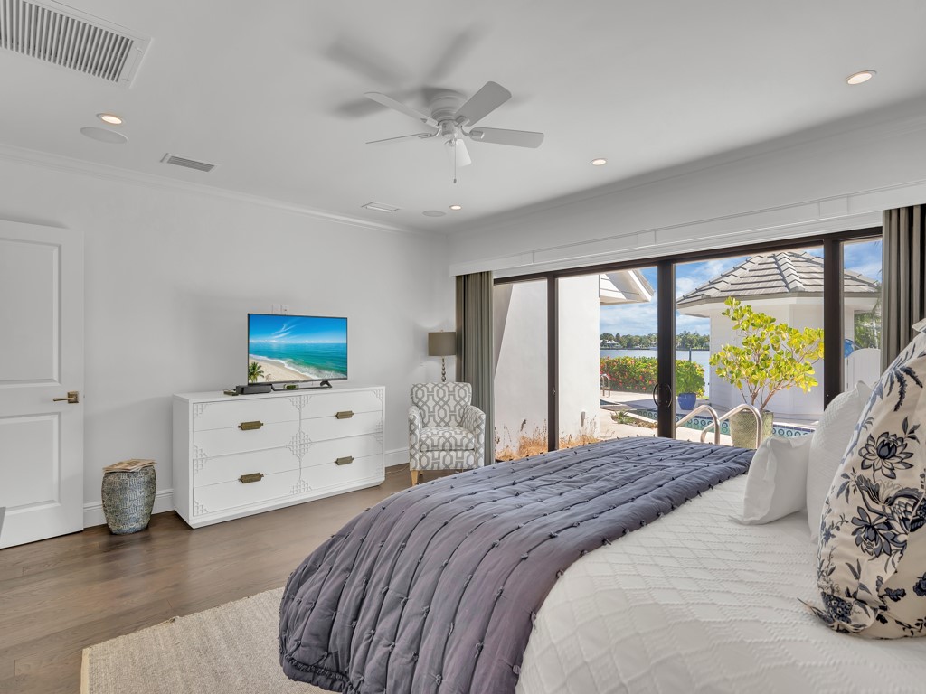 245 Springline Drive Vero Beach, FL 32963 - Photo 15 of 35 a bedroom with a bed and a window