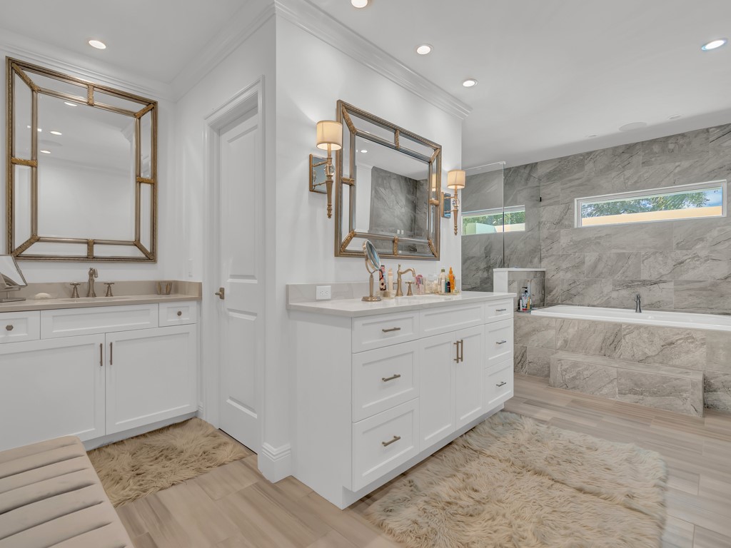 245 Springline Drive Vero Beach, FL 32963 - Photo 17 of 35 a bathroom with a double vanity sink mirror and double