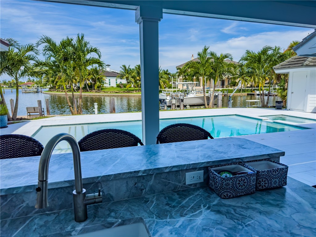 245 Springline Drive Vero Beach, FL 32963 - Photo 28 of 35 a room with furniture and a potted plant