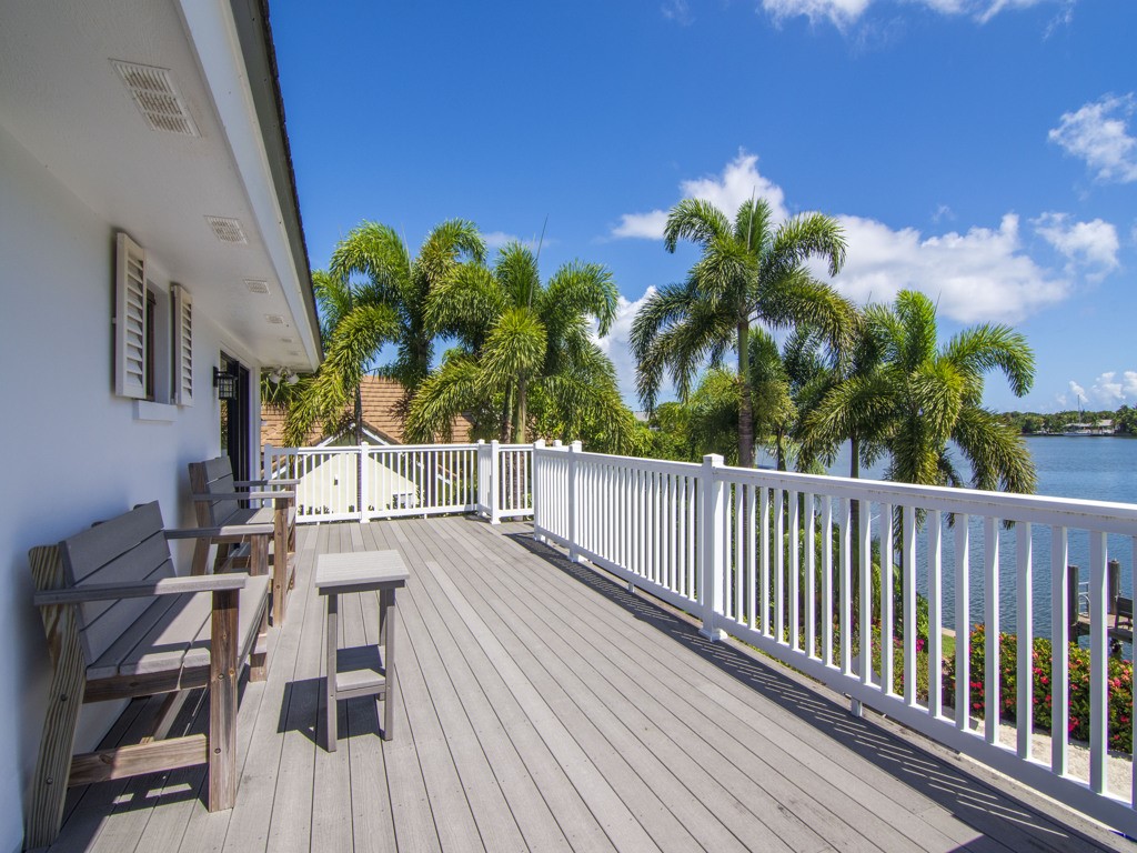 245 Springline Drive Vero Beach, FL 32963 - Photo 29 of 35 a view of a balcony with chairs