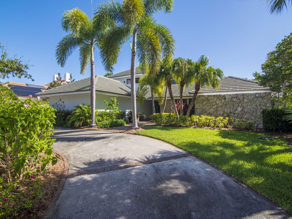245 Springline Drive Vero Beach, FL 32963 - Photo 3 of 35 a view of a backyard with a garden