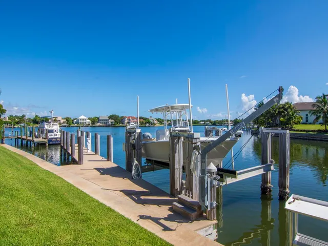 a view of a chairs and table on the deck