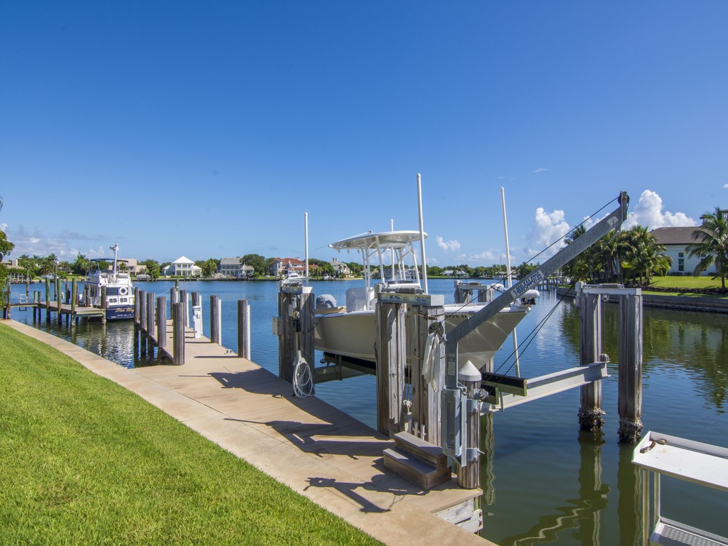 245 Springline Drive Vero Beach, FL 32963 - Photo 32 of 35 a view of a chairs and table on the deck