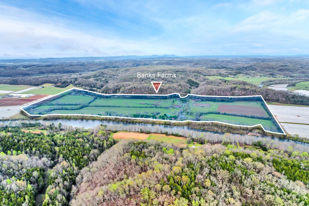 775 Bewleys Chapel Road Midway, TN 37809 - Photo 3 of 70 an aerial view of a house with a lake view
