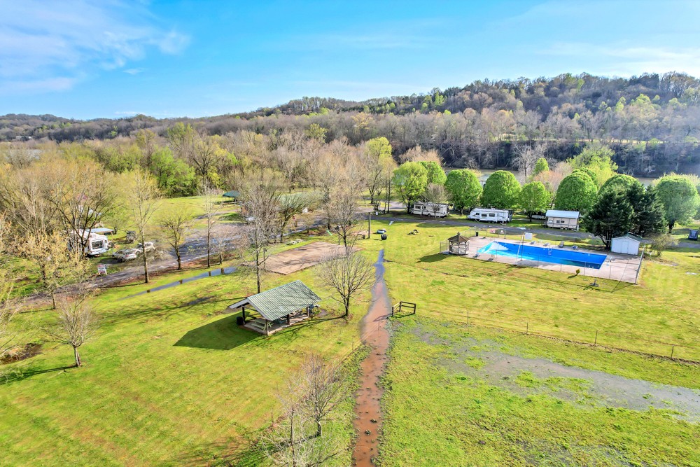 775 Bewleys Chapel Road Midway, TN 37809 - Photo 39 of 70 a view of a swimming pool with an ocean and mountain view