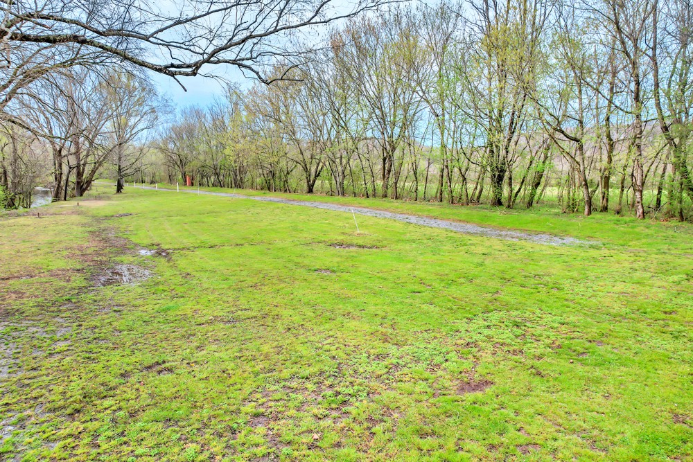 775 Bewleys Chapel Road Midway, TN 37809 - Photo 43 of 70 a view of a field with trees