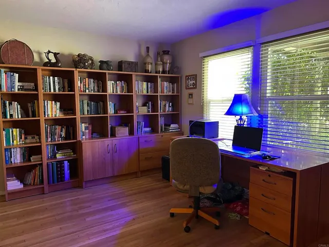 a room with furniture and a window