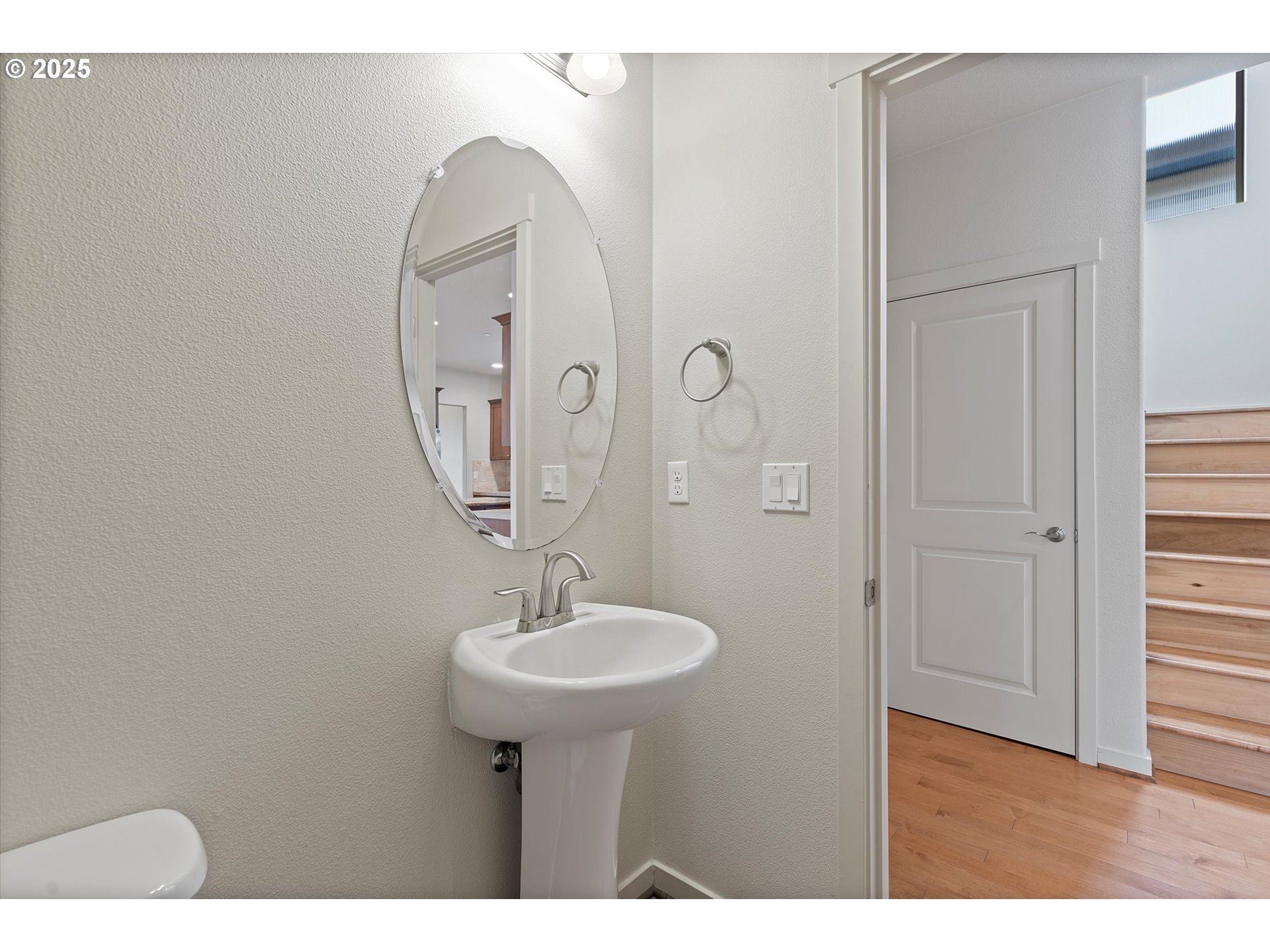 12001 Southwest Surrey Street Wilsonville, OR 97070 - Photo 18 of 48 a bathroom with a sink and a mirror