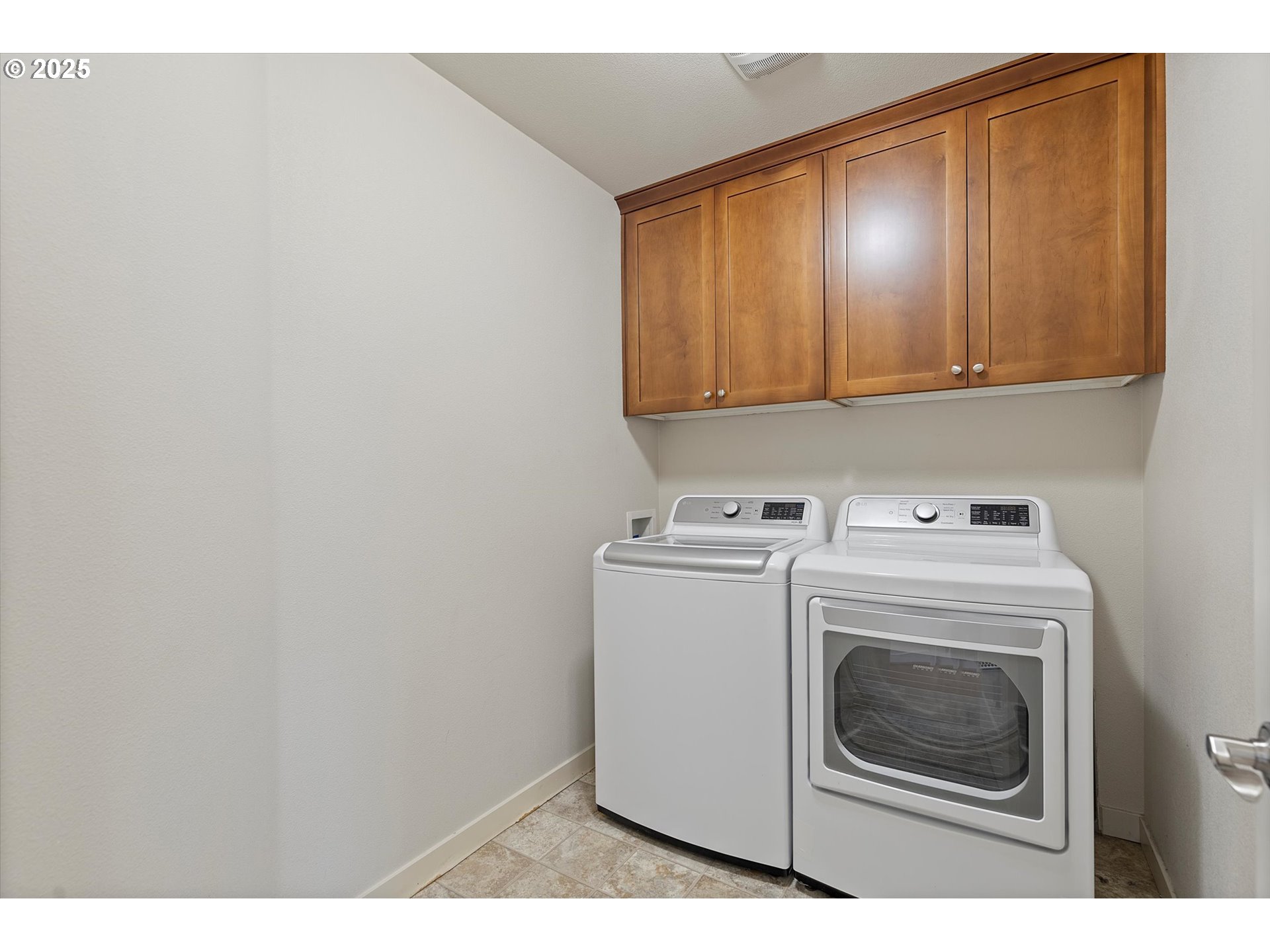 12001 Southwest Surrey Street Wilsonville, OR 97070 - Photo 26 of 48 a utility room with dryer and washer