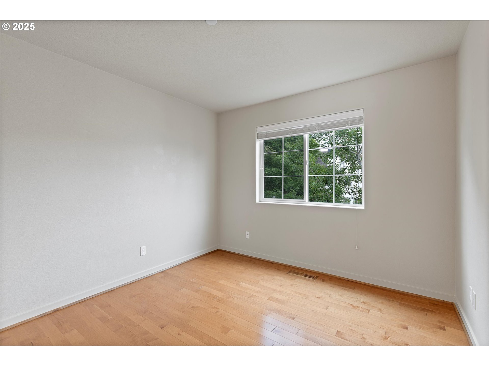 12001 Southwest Surrey Street Wilsonville, OR 97070 - Photo 27 of 48 a view of an empty room with a window
