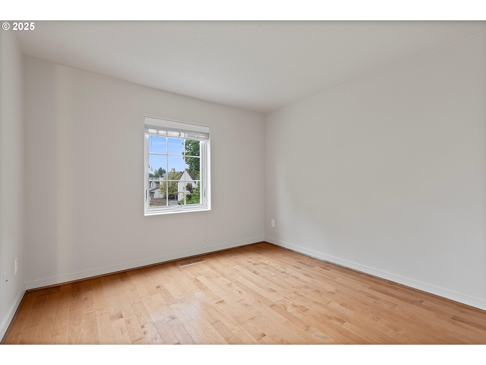 12001 Southwest Surrey Street Wilsonville, OR 97070 - Photo 36 of 48 a view of an empty room and window