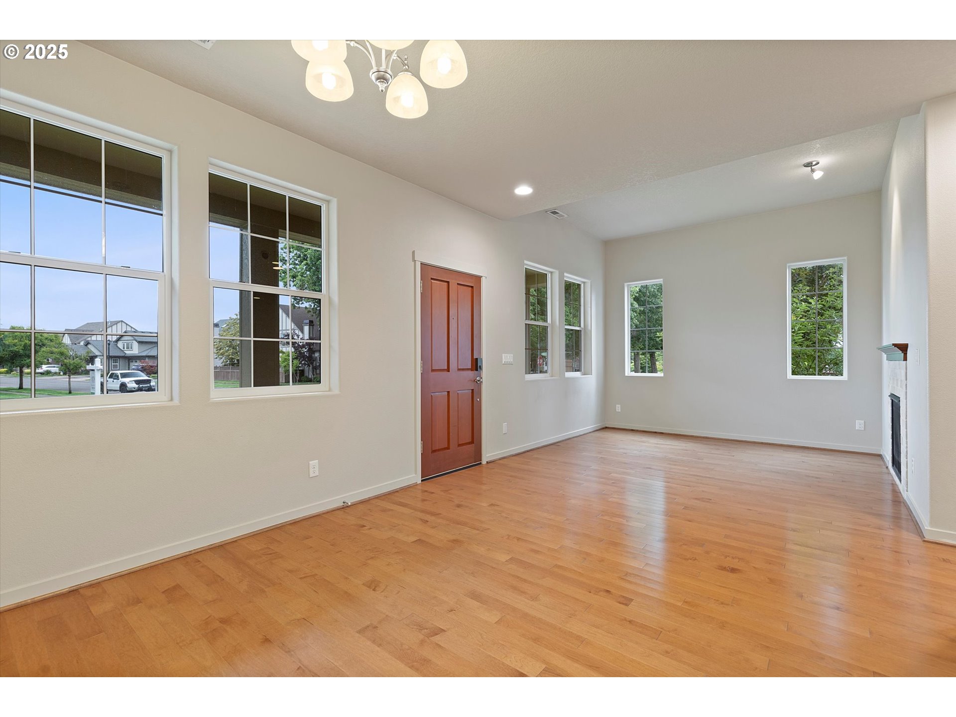 12001 Southwest Surrey Street Wilsonville, OR 97070 - Photo 5 of 48 a view of an empty room with a window