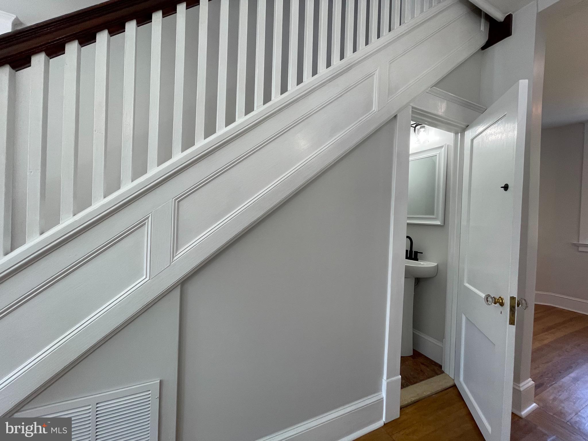 9812 Liberty Road Frederick, MD 21701 - Photo 11 of 33 Half bath under main stair