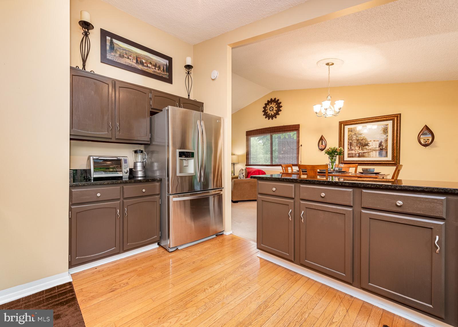 5405 Lightning View Road Columbia, MD 21045 - Photo 13 of 50 Refinished cabinets, granite and SS appliances