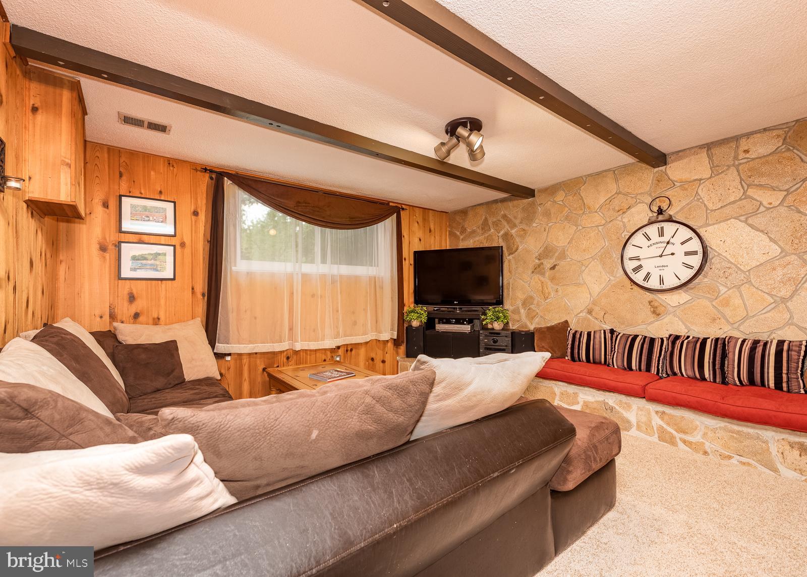 5405 Lightning View Road Columbia, MD 21045 - Photo 33 of 50 Stone wall has built in seating!