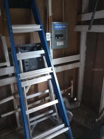 a stove top oven sitting inside of a kitchen