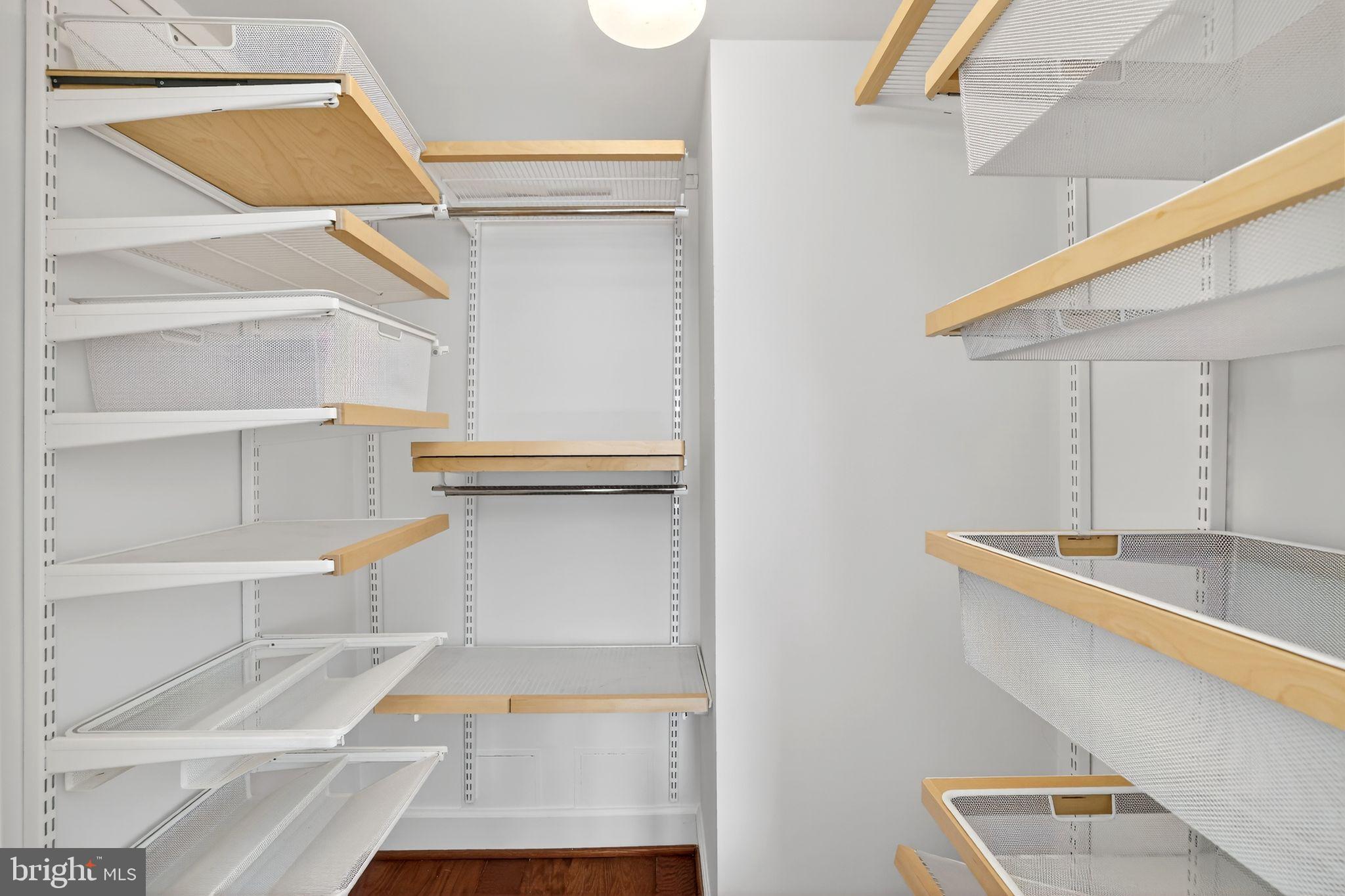 3805 Porter Street Northwest, Unit 201 Washington, DC 20016 - Photo 8 of 19 a view of walk in closet with empty racks