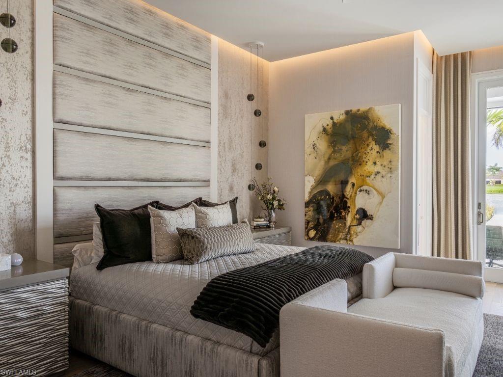 6199 Highcroft Drive Naples, FL 34119 - Photo 14 of 45 Primary bedroom with custom upholstery headboard