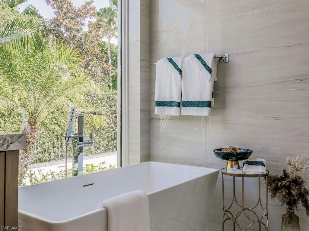6199 Highcroft Drive Naples, FL 34119 - Photo 25 of 45 freestanding tub, built in window coverings for privacy