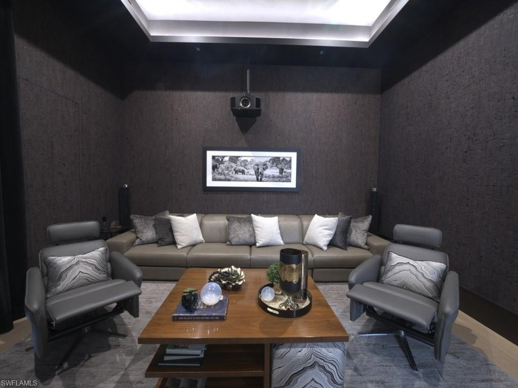 6199 Highcroft Drive Naples, FL 34119 - Photo 28 of 45 Sound proof cinema room, with electric reclining sofa and recliner chairs.