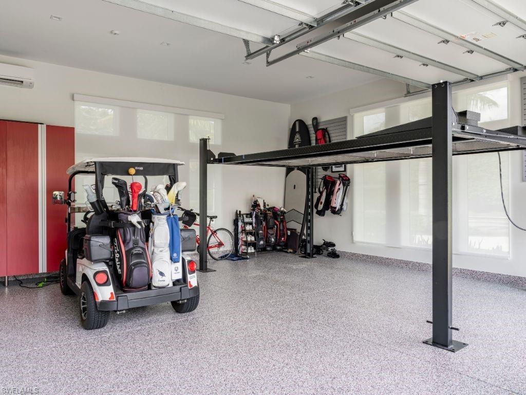 6199 Highcroft Drive Naples, FL 34119 - Photo 34 of 45 Garage 1 with a mini split for heating / cooling