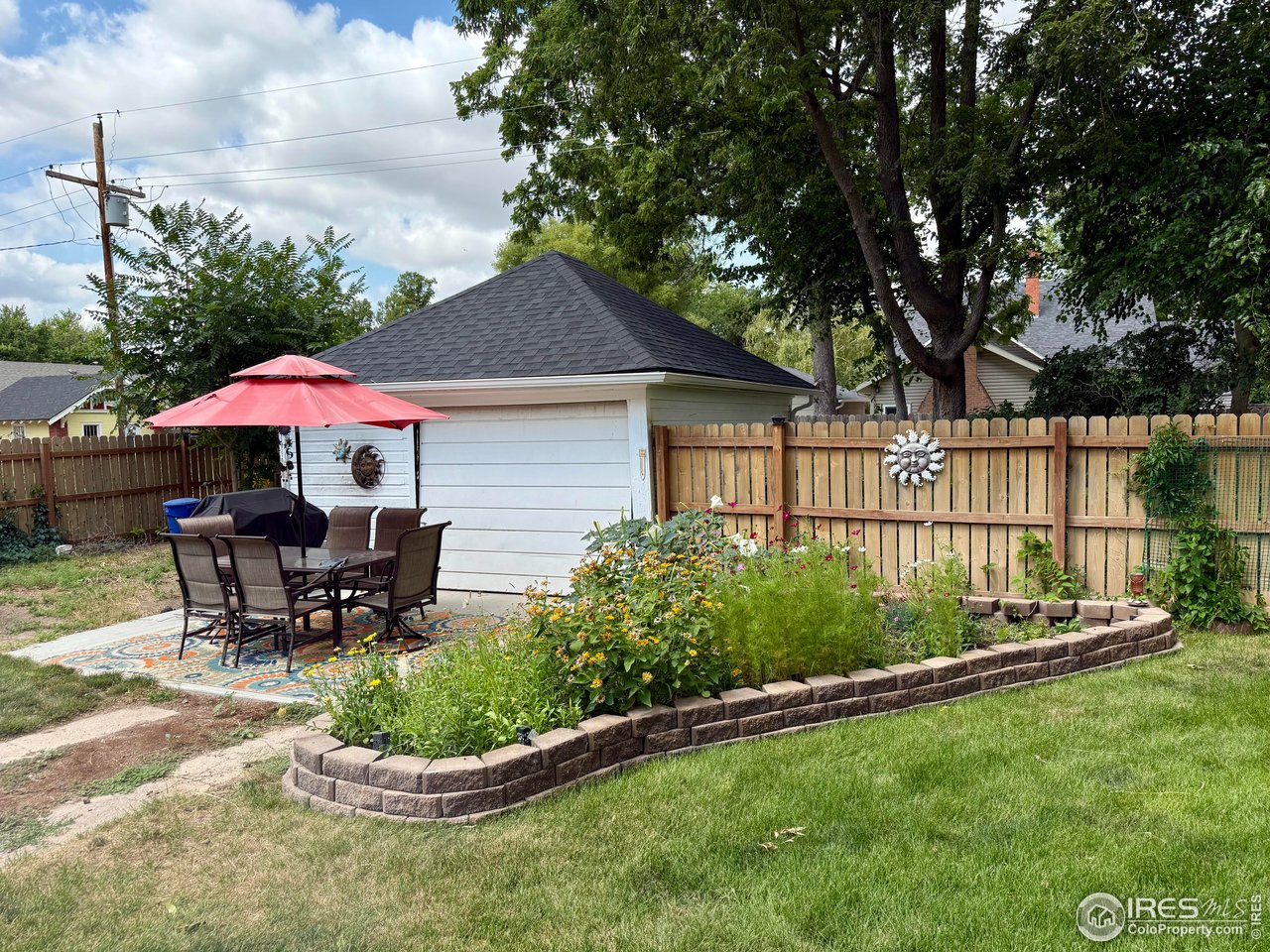 406 South Morlan Avenue Holyoke, CO 80734 - Photo 30 of 38 a garden view with a seating space